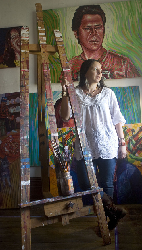 Al Hartmann  |  The Salt Lake Tribune 
Ruby Chacon artist and curator of Mestizo gallery stands next to an art easel she received for Christmas when she was 20 years old.  She still uses it today in her studio.