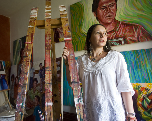 Al Hartmann  |  The Salt Lake Tribune 
Ruby Chacon artist and curator of Mestizo gallery stands next to an art easel she received for Christmas when she was 20 years old.  She still uses it today in her studio.