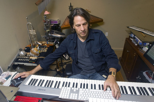 Al Hartmann  |  The Salt Lake Tribune 
Utah composer Kurt Bestor prepares for his 22nd annual Christmas concert series at his home studio.  He uses modern technology to compose his music and connect with his band members and audiences.  He often composes with one hand on a music keyboard and the other on a computer keyboard.