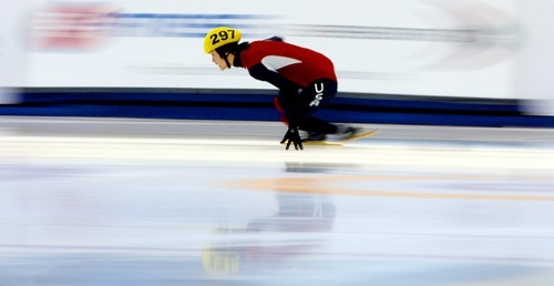 Steve Griffin  |  The Salt Lake Tribune
 
Simon Cho glides around a corner during the 1000-meter time trial at the U.S. Short-Track Speedskating championships at the Utah Olympic Oval in Kearns Friday, December 17, 2010.