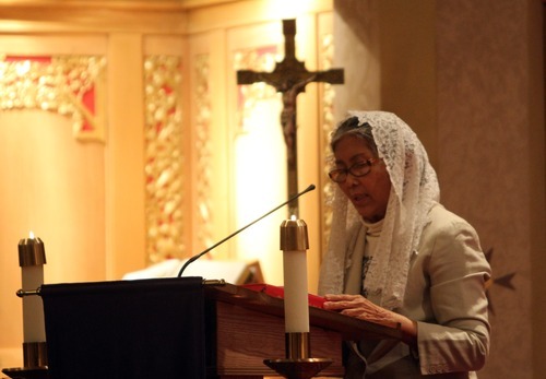 Rick Egan   |  The Salt Lake Tribune

Zenaida Torres gives a scripture reading during mass at Our lady of Lourdes,  Wednesday, Dec.15, 2010. The Misang Bayan Filipino Catholic Community is sharing its Advent tradition at Our Lady of Lourdes. For the nine nights (a novena) leading up to Christmas, the community will celebrate mass at a different Utah parish.