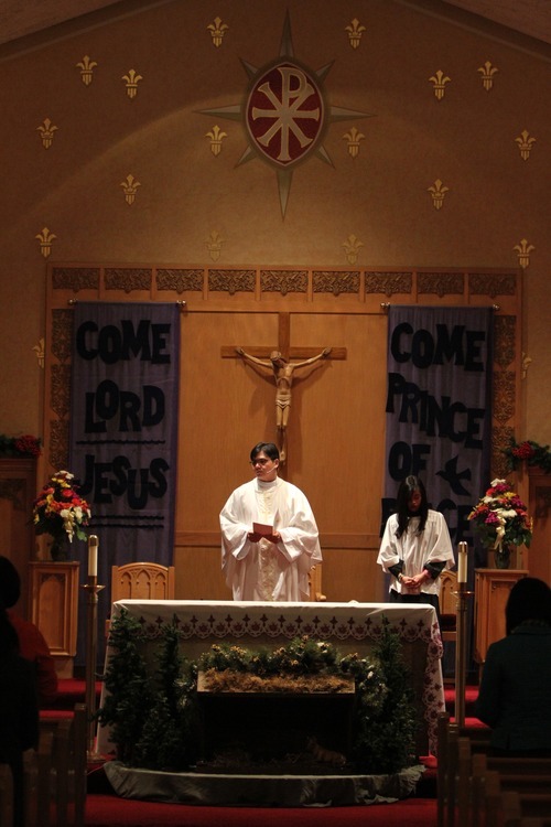 Rick Egan   |  The Salt Lake Tribune

Rev. Joseph Frez, a priest originally from the Philippines, prays during mass at Our lady of Lourdes,  Wednesday, Dec. 15, 2010.
