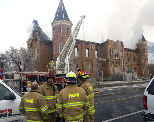 Al Hartmann  |  The Salt Lake Tribune 
Firefighers on Friday morning continue to battle a fire at the historic Provo Tabernacle.