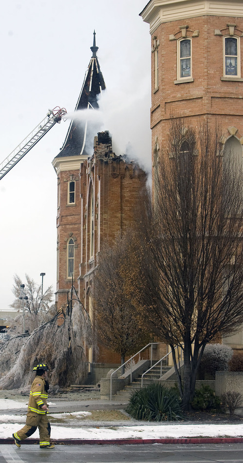 Al Hartmann  |  The Salt Lake Tribune 
The historic Provo Tabernacle continues to burn at 9 a.m. on Friday.