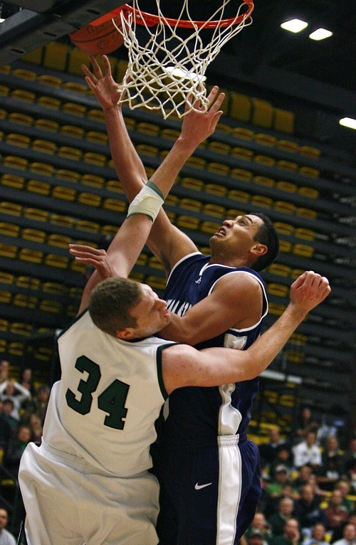 Djamila Grossman  |  The Salt Lake Tribune

Utah State University's Tai Wesley, 42, tries to score and pushes over Utah Valley University's Ben Aird, 34, during the first half of a game at UVU, Saturday, Dec. 18, 2010.