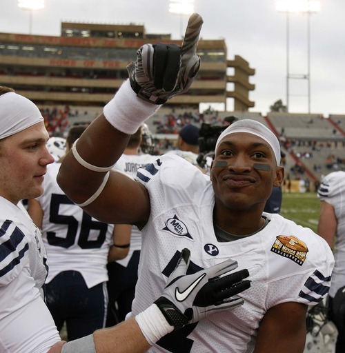 Trent Nelson  |  The Salt Lake Tribune
BYU defensive back Brian Logan (7) points to BYU fans in the final minutes as BYU defeats UTEP in the New Mexico Bowl, college football Saturday, December 18, 2010 in Albuquerque, New Mexico.