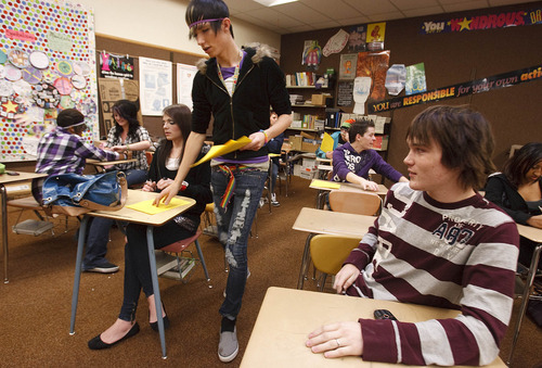 Leah Hogsten  |  The Salt Lake Tribune
Above, senior Stetson Sheffield (right) hands out questionnaires at a meeting of the Clearfield High Gay-Straight Alliance on Dec. 9, 2010.