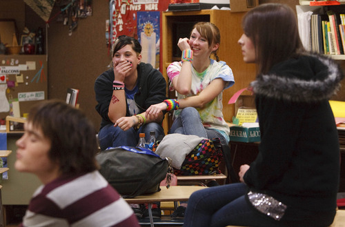 Leah Hogsten  |  The Salt Lake Tribune

Friends Courtney Eaves (left) and Baylie McKnight (right) share a laugh with each other during a meeting of the Clearfield High Gay-Straight Alliance. Members of the student club met on Dec. 9, 2010.