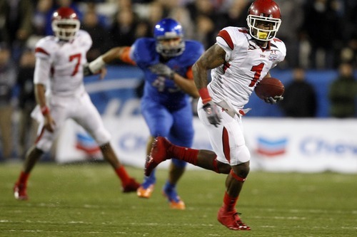 Chris Detrick  |  The Salt Lake Tribune 
Utah Utes wide receiver Shaky Smithson #1 runs the ball past Boise State Broncos defensive tackle Ricky Tjong-A-Tjoe #43 during the first half of the Maaco Bowl at Sam Boyd Stadium Wednesday December 22, 2010.   Boise State is winning the game 16-3.