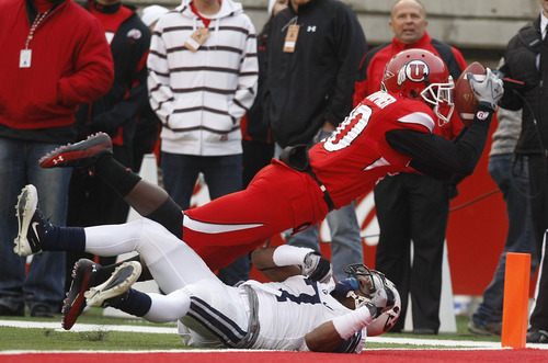 Chris Detrick  |  The Salt Lake Tribune

Utah Utes wide receiver DeVonte Christopher #10 catches a pass for a touchdown under pressure from BYU defensive back Brian Logan (7) as the Utes face BYU in the third quarter at Rice-Eccles Stadium Saturday, November 27, 2010.