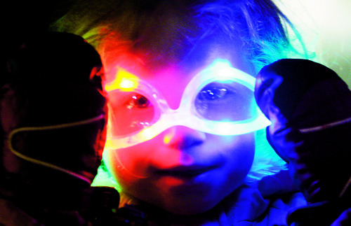 Rick Egan   |  The Salt Lake Tribune

 3-year-old Penelope Workman tries on some glowing glasses as the EVE celebration at the Gallivan Center,  Thursday, December 31, 2009