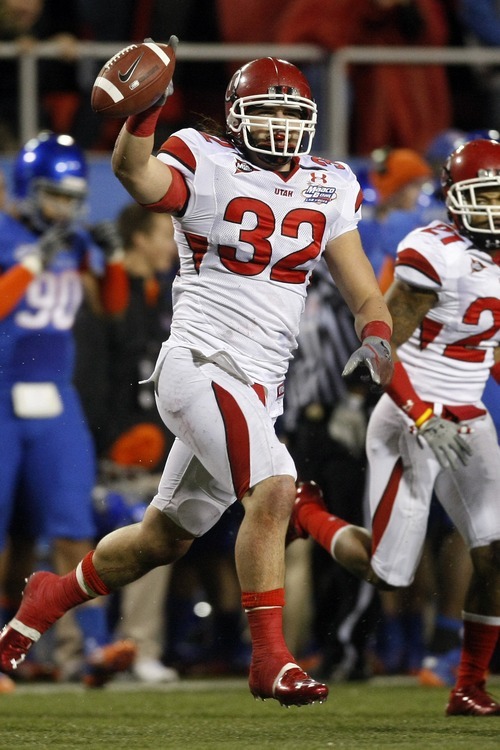 Chris Detrick  |  The Salt Lake Tribune 
Utah Utes linebacker Chaz Walker #32 celebrates after recovering a fumble during the first half of the Maaco Bowl at Sam Boyd Stadium Wednesday December 22, 2010.   Boise State won the game 26-3.