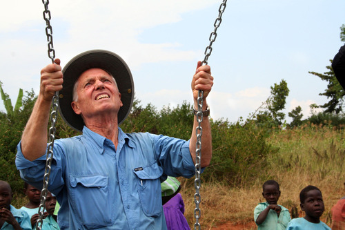 Jeremiah Stettler  |  The Salt Lake Tribune

Bill Grenney, founder of the Utah-based SEEE Institute, tests a swing set his organization built for a school along the shores of Lake Victoria. In was the Namatu Primary School's first piece of play equipment.