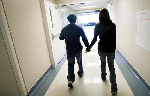 Djamila Grossman  |  The Salt Lake Tribune

Daniel Mancuso and his girlfriend Shyanne Jensen walk down a hallway at Primary Children's Medical Center in Salt Lake City, Monday, Dec. 20, 2010. The couple's daughter Alicen Taylor Mancuso was born on Nov. 19 in Bozeman, Mont., with congenital diaphragmatic hernia and had to be flown to Salt Lake City to undergo surgery.