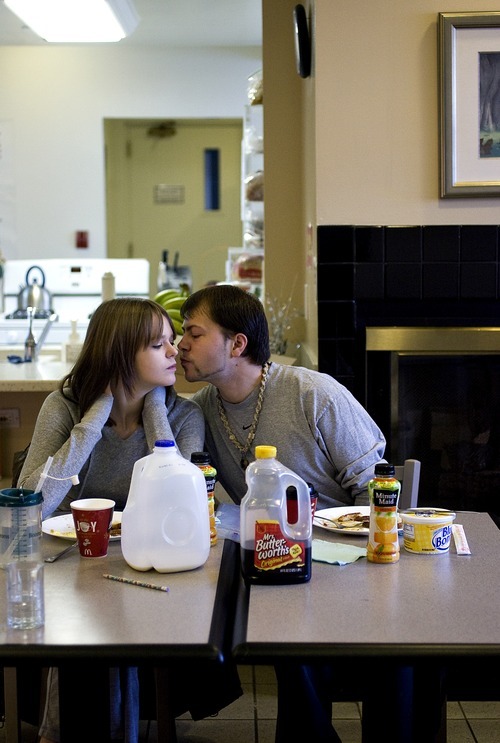 Djamila Grossman  |  The Salt Lake Tribune

Daniel Mancuso kisses his girlfriend Shyanne Jensen during breakfast at the Ronald McDonald House in Salt Lake City, Friday, Dec. 17, 2010. The couple's daughter Alicen Taylor Mancuso was born on Nov. 19 in Bozeman, Mont., with congenital diaphragmatic hernia and had to be flown to Salt Lake City to undergo surgery.