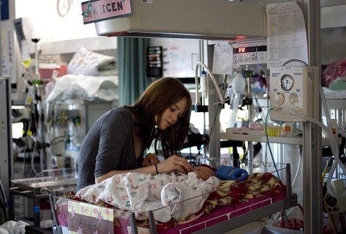 Djamila Grossman  |  The Salt Lake Tribune

Shyanne Jensen stands by the bed of her daughter Alicen Taylor Mancuso at Primary Children's Medical Center in Salt Lake City, Thursday, Dec. 16, 2010. Alicen was born Nov. 19 in Bozeman, Mont., with congenital diaphragmatic hernia and had to be flown to Salt Lake City to undergo surgery.