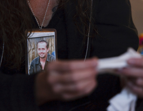 Leah Hogsten  |  The Salt Lake Tribune
Malachi Darcey's mother Babette Darcey wears a necklace with a photo of her son Thursday, December 23, 2010, in West Point.
Malachi Darcey was beaten to death outside the Outlaw Saloon bar Monday, August 30, 2010. To date, no arrests have been made.