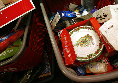 Scott Sommerdorf  l  The Salt Lake Tribune
Shopping carts filled with returned items brimmed behind the Customer Service desk at Target on Sunday, Dec. 26, 2010, the annual 