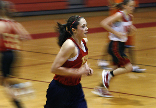 Scott Sommerdorf  l  The Salt Lake Tribune
Kaile Quinn, runs with the rest of the team during practice at Judge Memorial High School, Thursday, 12/23/2010.