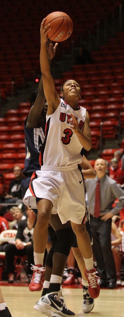 Rick Egan   |  The Salt Lake Tribune

Iwalani Rodrigues leads a fast break for the Utes, in Baskteball action Utah vs. Utah State at the Huntsman Center,  Saturday, January 1, 2011