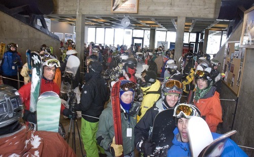 Paul Fraughton  |  The Salt Lake Tribune
Crowds of skiers and snowboarders stand in line waiting to board Snowbird's Tram on Thursday. The 2010-11 is starting off like gangbusters, with plentiful early snow attracting plenty of locals and increasing bookings by out-of-town guests.