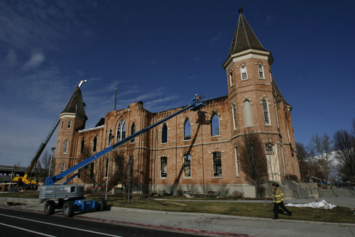 Francisco Kjolseth  |  The Salt Lake Tribune

Crews begin to remove debris Tuesday from the historic Provo Tabernacle following last week's fire that gutted the beloved building.