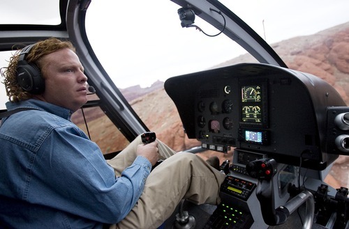 Djamila Grossman  |  The Salt Lake Tribune

Jeremy Johnson of St. George flies his helicopter Nov. 22 as part of a search to locate a man suspected of shooting state park ranger Brody Young near Moab. Johnson, who regularly volunteers in search efforts, went on an LDS mission to Missouri with Young.