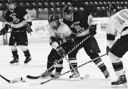 Leah Hogsten  |  The Salt Lake Tribune
l-r Jess Fletcher #19 of Brighton collides with  Talon Stauffer of Murray #15. The 2010-2011 Utah High School Hockey All-Star Game. Top hockey players from high schools throughout the state will face off in a North vs. South game. (North includes Davis County, Salt Lake City schools, Murray schools.... South includes South Jordan, Utah County, Sandy, Riverton, Park City schools).Saturday, January 1, 2011, in West Valley.