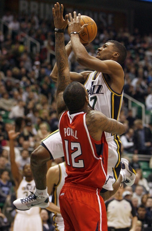 Steve Griffin  |  The Salt Lake Tribune
 
Utah Jazz guard Ronnie Price hangs in the air as he shoots during first half action of the Jazz versus Hawks game at EnergySolutions Arena in Salt Lake City Wednesday, January 5, 2011.