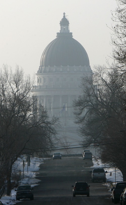 Steve Griffin  |  The Salt Lake Tribune
 
Haze surrounds the capitol as an inversion covers the Salt Lake Valley Friday, January 7, 2011.