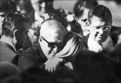 FILE  |  The Salt Lake Tribune
Terri Christensen, right center, is embraced by Gary Sheets at the funeral of Christensesn's husband, Steven. Steven Christensen was killed by a bomb blast in his downtown Salt Lake City office. Gary Sheets' wife, Kathy, died in a bomb hours later when she picked up a box police think was intended for Gary.