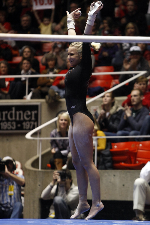 Chris Detrick  |  The Salt Lake Tribune 
Utah's Cortni Beers competes on the bars during the gymnastics meet against UCLA the Huntsman Center Friday January 7, 2011. Utah won 195.700 - 195.300.