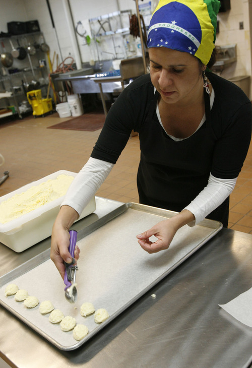 Francisco Kjolseth  |  The Salt Lake Tribune
Debora Hammond scoops out small balls of dough featuring her family's recipe for cheese bread, which is a gluten-free product sold in area grocery stores.