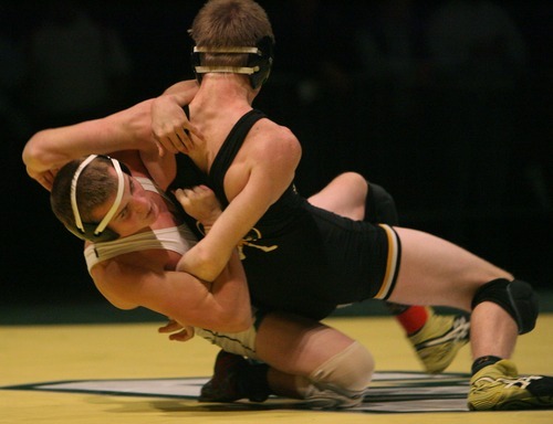 Steve Griffin  |  The Salt Lake Tribune
 
South Summit's Jeff McCormick, left, pulls Tanner Sweat, of Wasatch to the ground during their 140 pound match at the UAWF 2011 All-Star Dual wrestling tournament in at Utah Valley University in at Utah Valley University in Orem Tuesday, January 11, 2011.