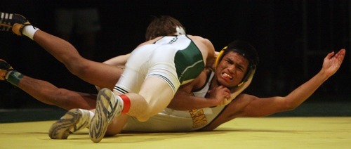 Steve Griffin  |  The Salt Lake Tribune
 
Abraham Hernandez, of Kearns, bottom, strains as he tries to escape the hold of Payson's Jed Mellen during their 140 pound match in the UAWF 2011 All-Star Dual wrestling tournament at Utah Valley University in Orem Tuesday, January 11, 2011.