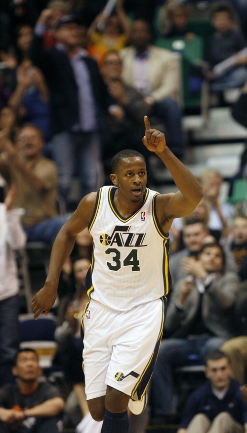 Steve Griffin  |  The Salt Lake Tribune
 
Utah's C.J. miles raises his finger after nailing a three pointer during the second half of the Jazz versus Knicks basketball game at EnergySolutions Arena in Salt Lake City Wednesday, January 12, 2011.