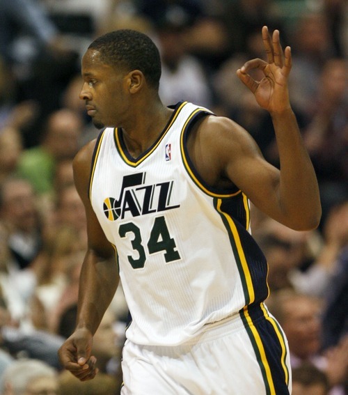 Steve Griffin  |  The Salt Lake Tribune
 
Utah's C.J. miles holds three fingers after nailing a three pointer during the second half of the Jazz versus Knicks basketball game at EnergySolutions Arena in Salt Lake City Wednesday, January 12, 2011.