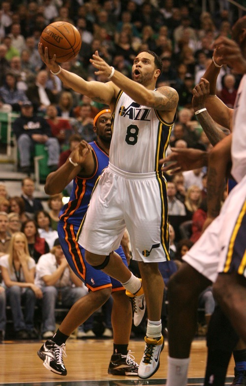 Steve Griffin  |  The Salt Lake Tribune
 
Utah's Deron Williams stretches out as he lays in two points during the first half of the Jazz versus Knicks basketball game at EnergySolutions Arena in Salt Lake City Wednesday, January 12, 2011.