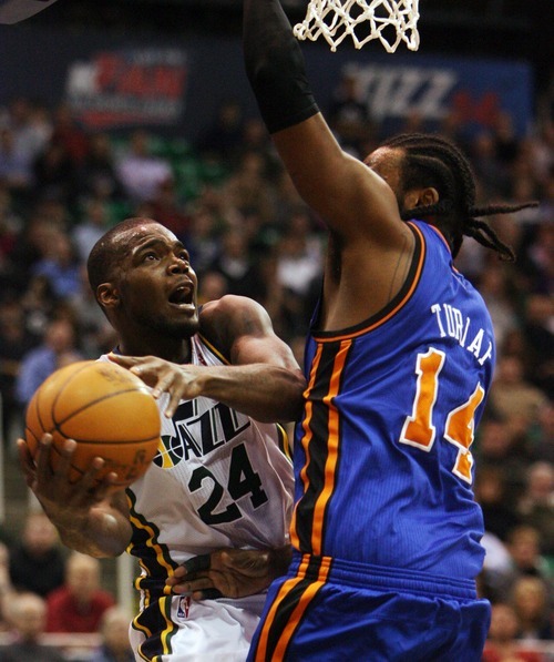 Steve Griffin  |  The Salt Lake Tribune
 
Utah's Paul Millasap tries to get around New York's Ronny Turiaf during the first half of the Jazz versus Knicks basketball game at EnergySolutions Arena in Salt Lake City Wednesday, January 12, 2011.