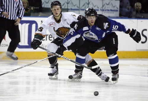Djamila Grossman  |  The Salt Lake Tribune

The Grizzlies' Giffen Nyren, 55, and Idaho Steelheads' Geoff Irwin, 15, try to reach the puck during a game at the Maverik Center in West Valley City, Wednesday, Jan. 12, 2011. Idaho won the game.