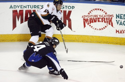 Djamila Grossman  |  The Salt Lake Tribune

The Grizzlies' Hugo Carpentier, 49, and Idaho Steelheads' Steve Oleksy, 24, try to gain control of the puck, during a game at the Maverik Center in West Valley City, Wednesday, Jan. 12, 2011.