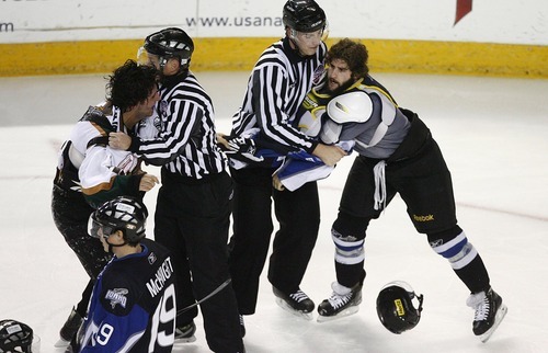 Djamila Grossman  |  The Salt Lake Tribune

The Grizzlies' Nick Tuzzolino, 74, and the Idaho Steelheads' Cody Lampl, 2, get into a fight during a game at the Maverik Center in West Valley City, Wednesday, Jan. 12, 2011. Idaho won the game.