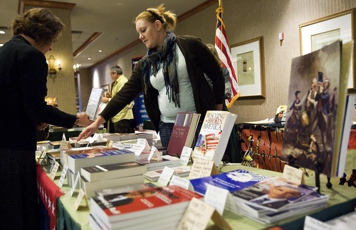 Djamila Grossman  |  The Salt Lake Tribune

Jerilyn Brunson with My Freedom Library talks about a book to Shacke Rose at the Eagle Forum annual convention in Salt Lake City, Saturday, Jan. 15, 2011.