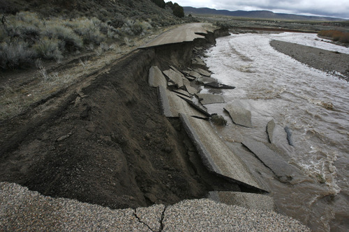 Rick Egan   |  The Salt Lake Tribune
The Shoal Creek Rver washed away portions of the Shoal Creek Road, near Enterprise, during the high run Dec. 23, 2010.  The Shoal Creek Road leads to the Enterprise reservoirs.