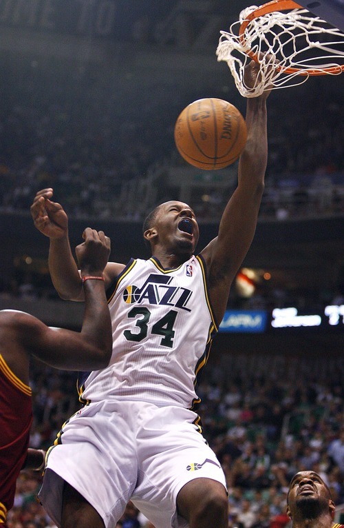 Djamila Grossman  |  The Salt Lake Tribune

The Utah Jazz's C.J. Miles, 34,  dunks the ball in a game against Cleveland in Salt Lake City, Friday, Jan. 14, 2011.