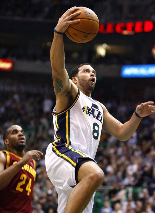 Djamila Grossman  |  The Salt Lake Tribune

The Utah Jazz's Deron Williams, 8, goes in to score in a game against Cleveland in Salt Lake City, Friday, Jan. 14, 2011.