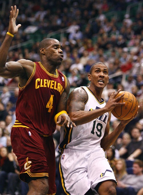 Djamila Grossman  |  The Salt Lake Tribune

The Utah Jazz's Raja Bell, 19, drives toward the basket, guarded by Cleveland's Antawn Jamison, 4, during a game in Salt Lake City, Friday, Jan. 14, 2011. The Jazz won the game.