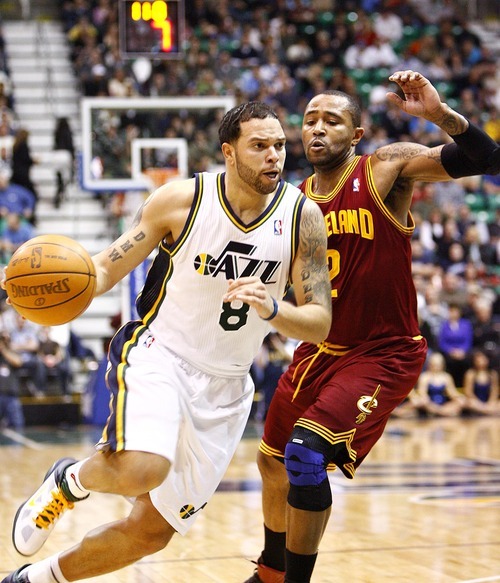 Djamila Grossman  |  The Salt Lake Tribune

The Utah Jazz's Deron Williams, 8, drives past Cleveland's Mo Williams, 2, during a game in Salt Lake City, Friday, Jan. 14, 2011. The Jazz won the game.