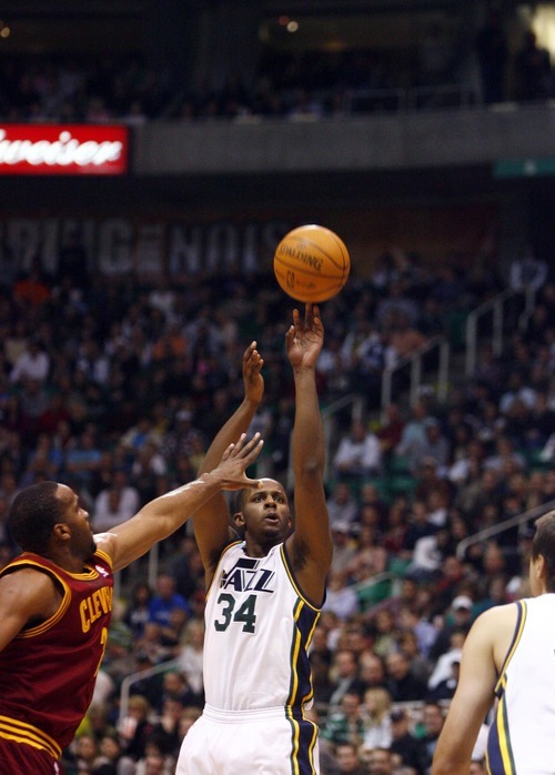 Djamila Grossman  |  The Salt Lake Tribune

The Utah Jazz's C.J. Miles takes a shot at the basket during a game against Cleveland in Salt Lake City, Friday, Jan. 14, 2011. The Jazz won the game.