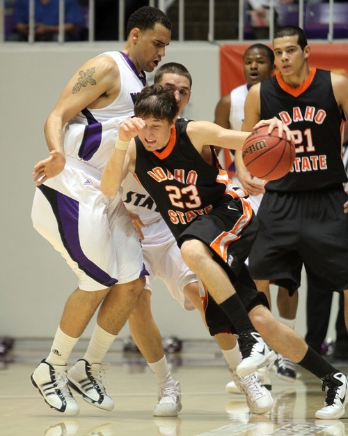 Rick Egan   |  The Salt Lake Tribune

Trevor Morris (55) Weber gets called for a foul as Bengal, Chase Grabau collides with him,in basketball action Weber State vs Idaho State, in Ogden, Saturday, January 15, 2011